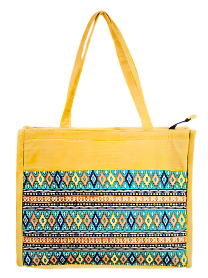 Yellow tote bag with a colorful patterned bottom section on a white background